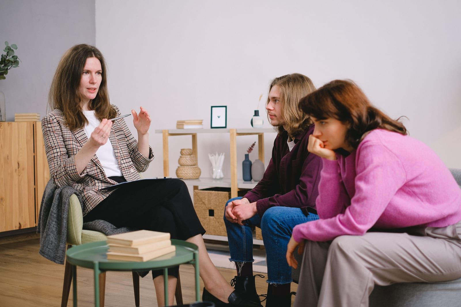 A student or early-career professional reviewing notes while planning a future career in counselling